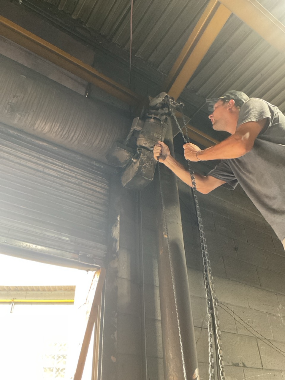 Tyler working on Commercial operator Collin Yenerich